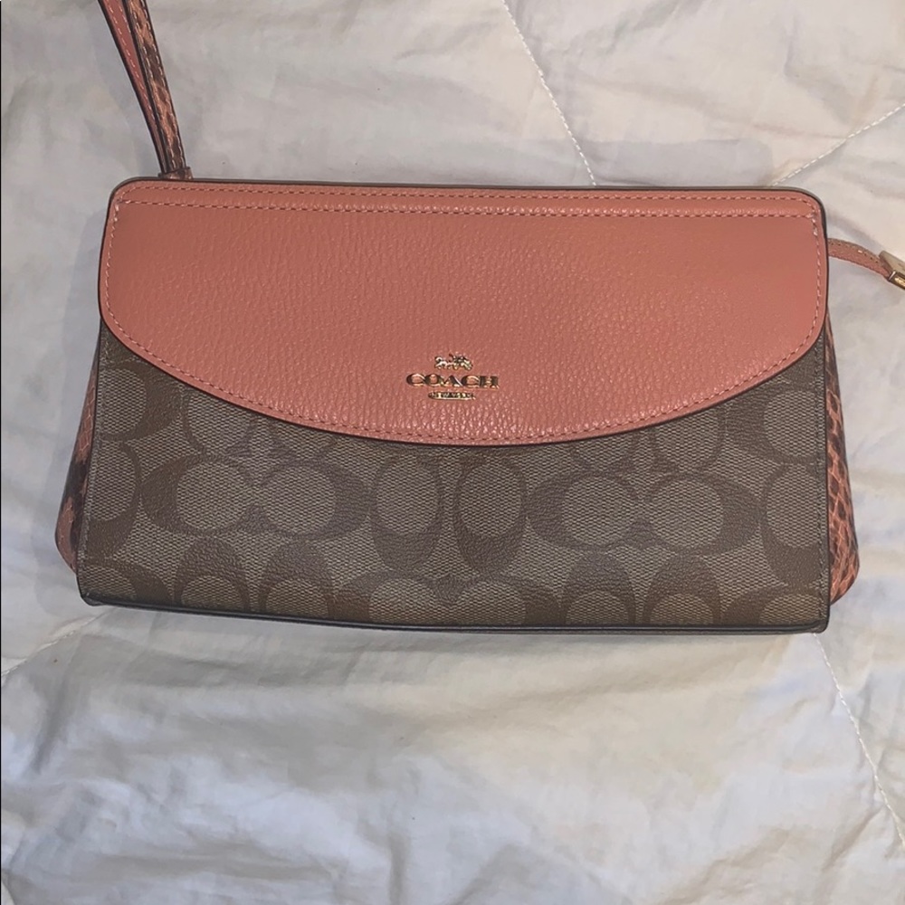 Brand new without tags Coach coral clutch